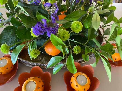 Flowers and orange candles